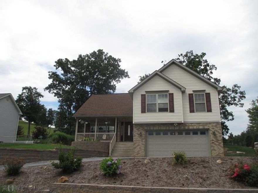 MOTIVATED SELLER!! Well maintained home that features new carpet in the bedrooms, a partially finished basement that includes a living room with a fireplace and a half bath. This home also features a new retaining wall in the front and in the back yard that is tiered. Enjoy a view of the mountains while sitting on the covered front porch.