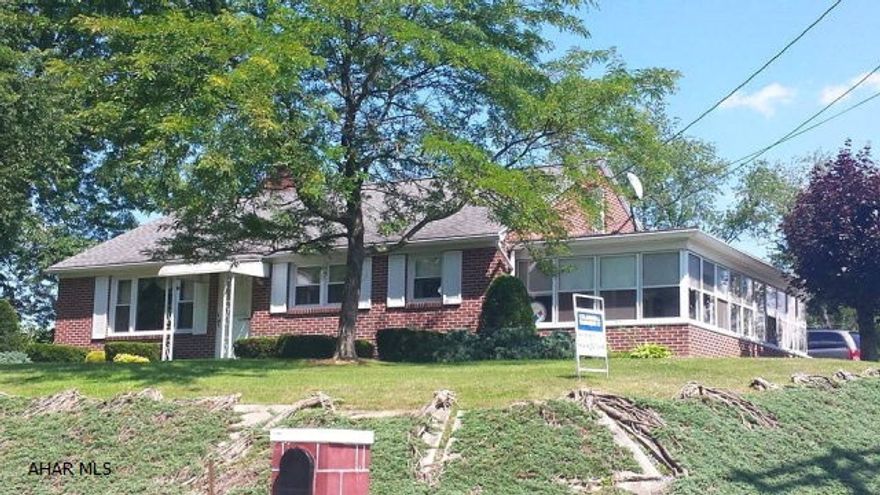 Very nice all brick home. Three bedrooms, open kitchen and dining room, large living room with fireplace and picture window,  plus a 12 x 27 sunroom with gorgeous views. New roof and windows. Partially finished basement ideal for game room or recreational room. Beautiful private yard with flowering trees. Ideal location for easy commute to I 70. Priced to sell!