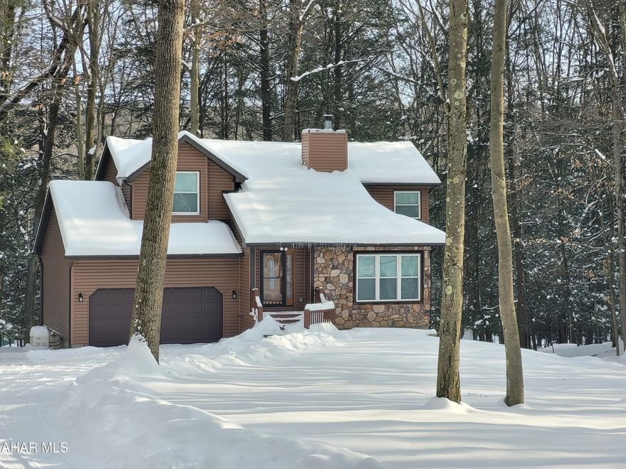 Meticulously maintained three bedroom home on over one acre.  Sellers are downsizing after making many upgrades.  Cozy up in front of the gas fireplace in the winter and enjoy the expansive back deck when the weather warms up.   The full finished basement offers you additional, private living space.  The two car garage and the shed add storage space.  
The sellers replaced all of the windows and most outer doors, had new siding and gutters installed.  The water heater, and kitchen appliances are new along with carpeting in several areas.  You have no worries if the power goes out as they added a new Generac generator.  Many other upgrades will offer you peace of mind when you move into this charming home located in Glendale Yearound on a quiet lane.
The private development adjacent to Prince Gallitzin State Park / Glendale Lake has a clubhouse, seasonal swimming pool, tennis / basketball / volleyball courts, dog park, planned activities and more.

Seller may need time to find suitable houseing.