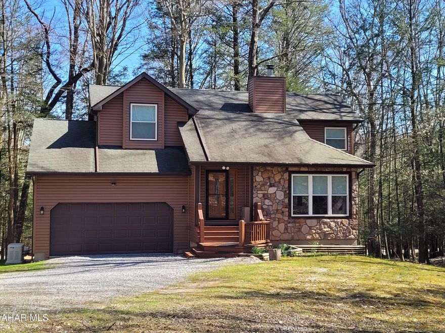 Meticulously maintained three bedroom home on over one acre.  Sellers are downsizing after making many upgrades.  Cozy up in front of the gas fireplace in the winter and enjoy the expansive back deck when the weather warms up.   The full finished basement offers you additional, private living space.  The two car garage and the shed add storage space.  
The sellers replaced all of the windows and most outer doors, had new siding and gutters installed.  The water heater, and kitchen appliances are new along with carpeting in several areas.  You have no worries if the power goes out as they added a new Generac generator.  Many other upgrades will offer you peace of mind when you move into this charming home located in Glendale Yearound on a quiet lane.
The private development adjacent to Prince Gallitzin State Park / Glendale Lake has a clubhouse, seasonal swimming pool, tennis / basketball / volleyball courts, dog park, planned activities and more.

Seller may need time to find suitable houseing.

Property is pending with contingencies.