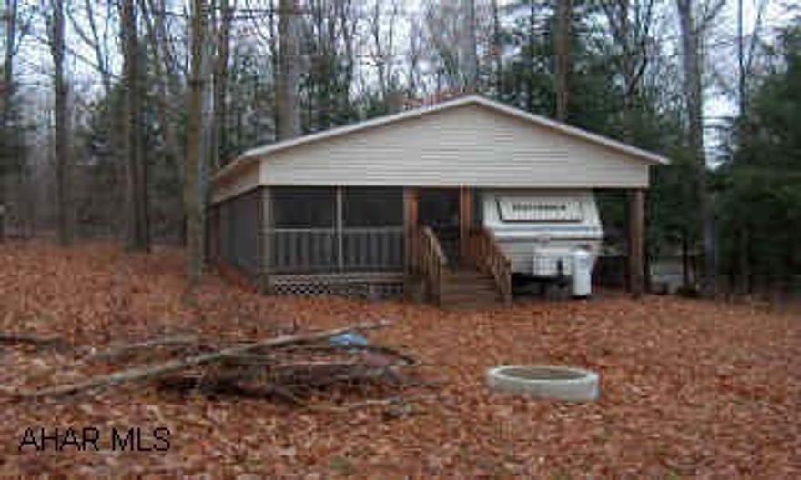 EXTRA large camp lot inside Glendale Yearound. 35' Dutchman (1991) w/ slide out, pavillion & screened in porch