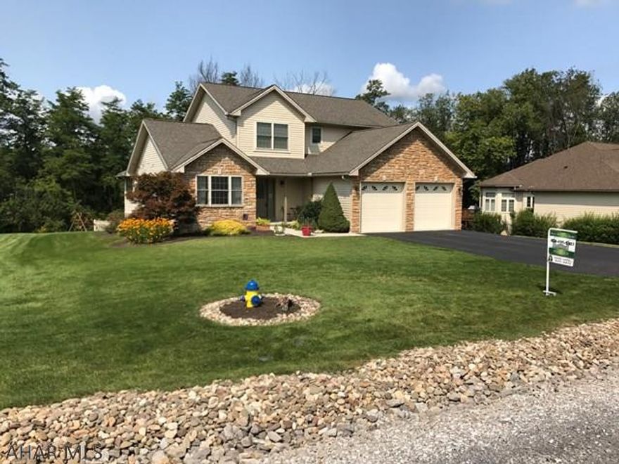 Beautiful  2 Story home with a Master Bedroom and Master Bath on the first floor and a Walk-in Closet.  First Floor Laundry. New Appliances, New Carpet throughout. Freshly painted, Gas Fireplace In the living room, Deck off the sunroom.  Beautiful landscaped lot. Basement has small garage for lawn mowers and lawn equipment with garage door and door opener. This home is move in ready.