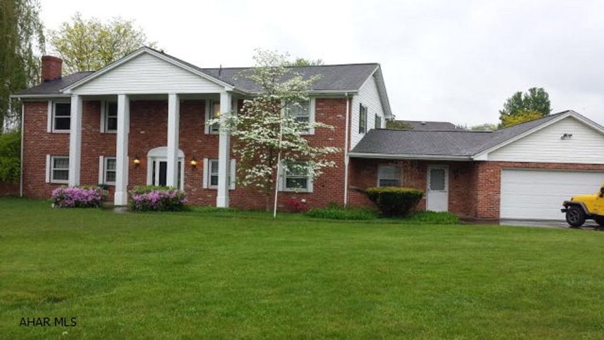 Large 4BR, 3BA home on large flat lot in Penn Farms. Quiet street & mature trees.  Family room plus two bonus rooms on lower level.  2 car garage, updated bathrooms, oak hardwood floors, private screened in porch.  Professionally cleaned and freshly painted.