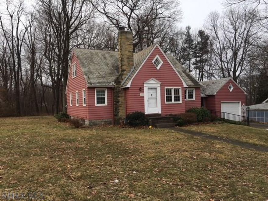 4 Bedroom home situated on almost 1/2 acre lot. Excellent floor plan featuring a breezeway between the house and the garage. Kitchen is bright with family room off of kitchen. Window bench is a plus in the dining room. Formal living room with fireplace, and nice entrance foyer. Most of the windows are newer, large bath with vanity area & laundry shoot. First floor master bedroom, other 3 bedrooms are upstairs. This home is filled with character & charm.