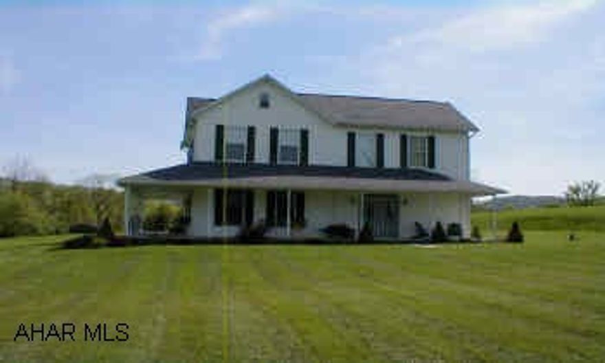 2 Story farm house. Completely remodeled/restored farm house with detached 3 car 11/2 story dormered garage. 1/2 story unfinished.   MLS School Dist has a choice of three posibilities. Wrap around porch, 2 staircases, 1st floor has 10' ceilings, 2nd floor has 9' ceilings, private 6 acre setting, dormered bonus room above garage (unfinished), superb decor, nice condition.  Driveway is on right of way.