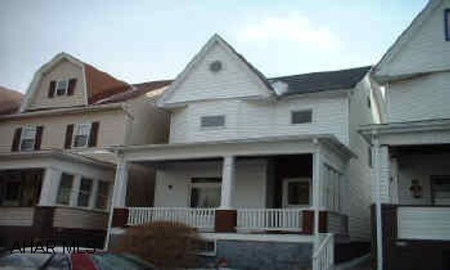 Great exterior, fenced in back yard, off street parking, interior needs cosmetic work, walk up attic possible 4th BR