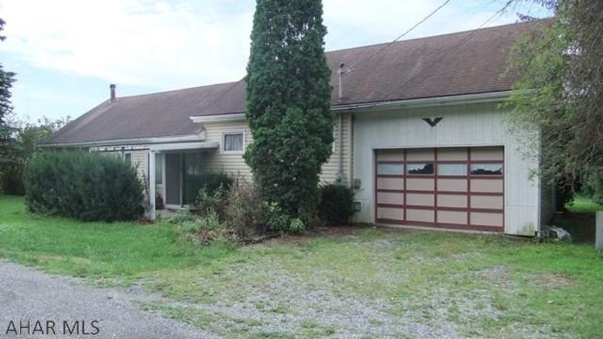 Roaring Spring Cape Cod style home being sold AS-IS.