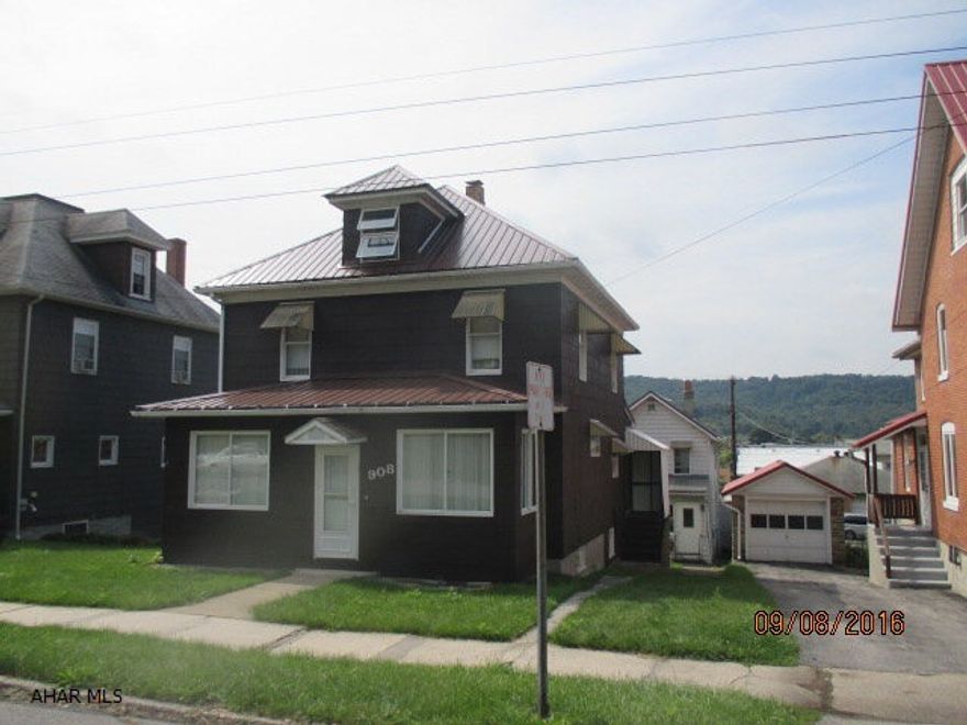 909 School Ave property located behind this home can be purchased together with this home. Currently rented. 2 bed, 1.5 bath with attached garage.Both properties have metal roofs 1 yr old.  Furnace on Chestnut property is less than a year old.Both properties have updated sewage in compliance with West Branch Sewage Authority.