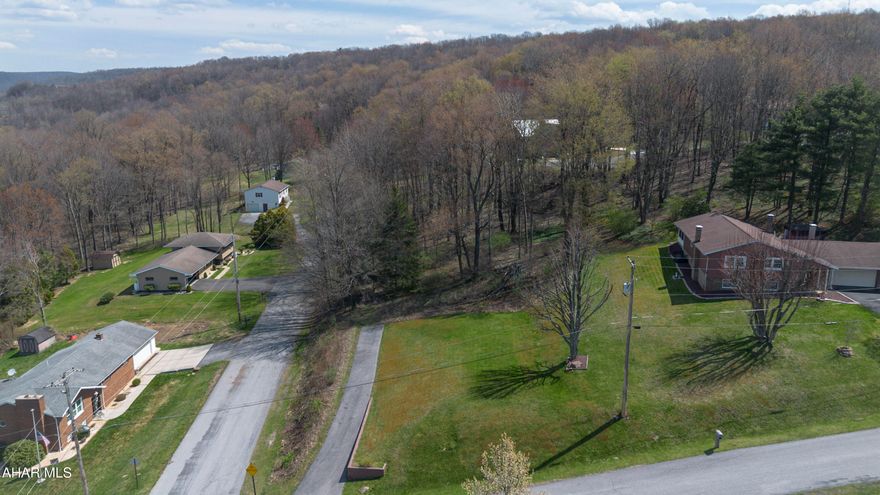 Spacious, level corner lot ideally situated at the intersection of High Street and Caldwell Avenue. This prime location offers both convenience and accessibility, just a short distance from nearby schools and local amenities. Public utilities--including water, sewer, and electric--are already available on-site, providing a strong foundation for your next project.

Seeking a smart land investment? Ready to build the home of your dreams?  This property offers exceptional potential. Don't miss this opportunity!