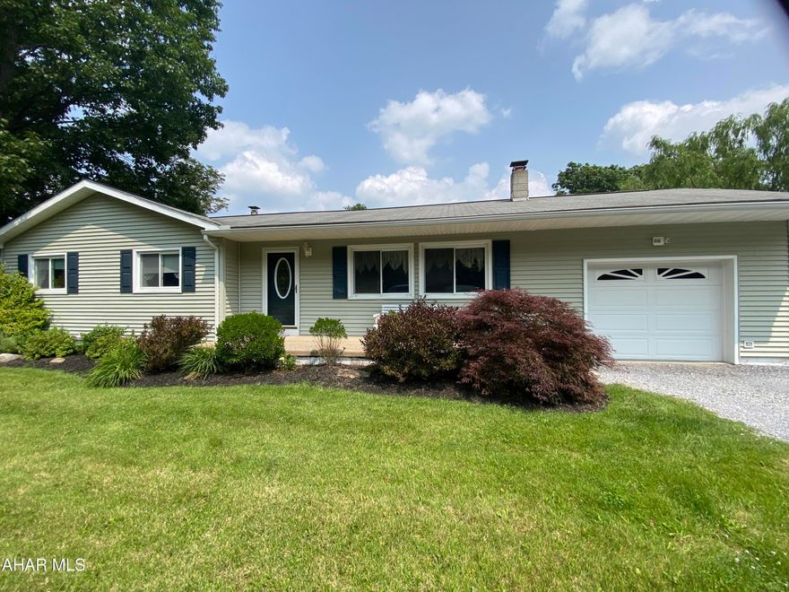 Stop looking for your ranch home in a peaceful setting... this is it! 0.9182 acre lot... all to yourself in quiet area of Carson Valley, HASD.  Very large, flat yard with mature trees surrounding home on corner lot. 3 large bedrooms with neutral carpet. Laminate flooring in kitchen, DR and LR. Master has an en suite bathroom. Additional full bath on main level and 1/2 bath on lower level adjacent to finished family room with wood burner, offering you an alternate heating source to save you money in the winter months. 1 car attached garage and central air.  Very well maintained home.  Schedule your showing today and start creating memories, calling this beauty home!