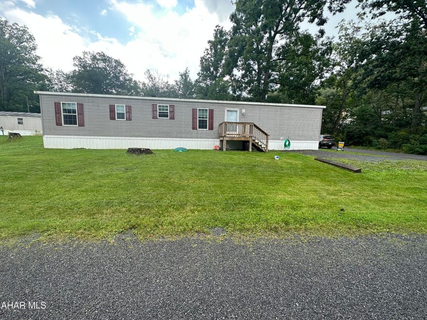 Gorgeous, modern 3 bedroom, 2 bathroom mobile home. One story living. Spacious master bathroom attached to master bedroom. Washer and dryer hook-ups installed. Move-in ready with kitchen appliances included. This well-maintained home offers two areas of access with a front entrance and back entrance. There are plenty of windows for natural light to shine through and make it serene.