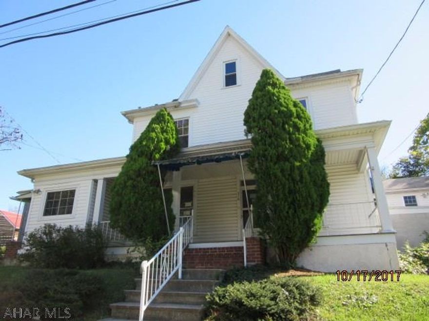 Loads of potential! 3 car attached garage at basement level with elevator, bonus room off of bedroom could be additional bedroom, 2 additional bonus rooms, huge living room