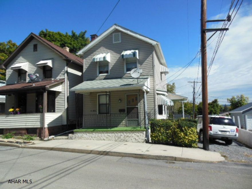 Quaint & comfortable 2BR, 1.25 bath home in Hollidaysburg within walking distance to Hometown Market grocery store. This home has updated/insulated windows, new carpeting, appliances, GHW heat, and more. This fine home has a larger kitchen and off street parking. Large bath with shower and new sink & vanity. 100 amp breakers in the large basement with a walkout, drains, and sump pump to keep it dry. Take a look!