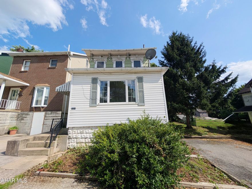 Two story Altoona home with formal living room, dining room and kitchen. 3 bedrooms (1 BR is captive) and finished attic. Concrete block 1 car garage plus double lot with plenty of off-street parking. Needs TLC, bur perfect for investors or handy persons. AS-IS sale, seller will make no repairs.