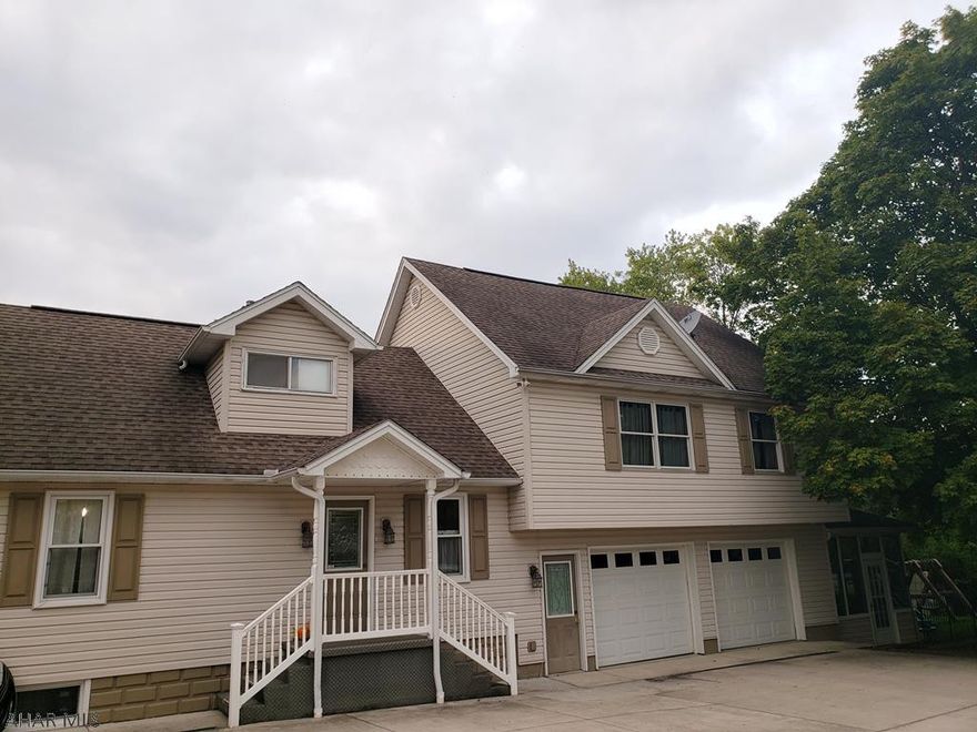 Wonderful house in Greenwood featuring a master suite fit for royalty!  3-4 bedrooms, 3.5 baths, and a finished basement level means plenty of space!  Owners purchased vacant lot next to house for a sizeable yard.  Garage also has a ton of storage.  You do not want to miss this house!  Tax ID:  14.00-22B2-021 & 14.00-22B2-022