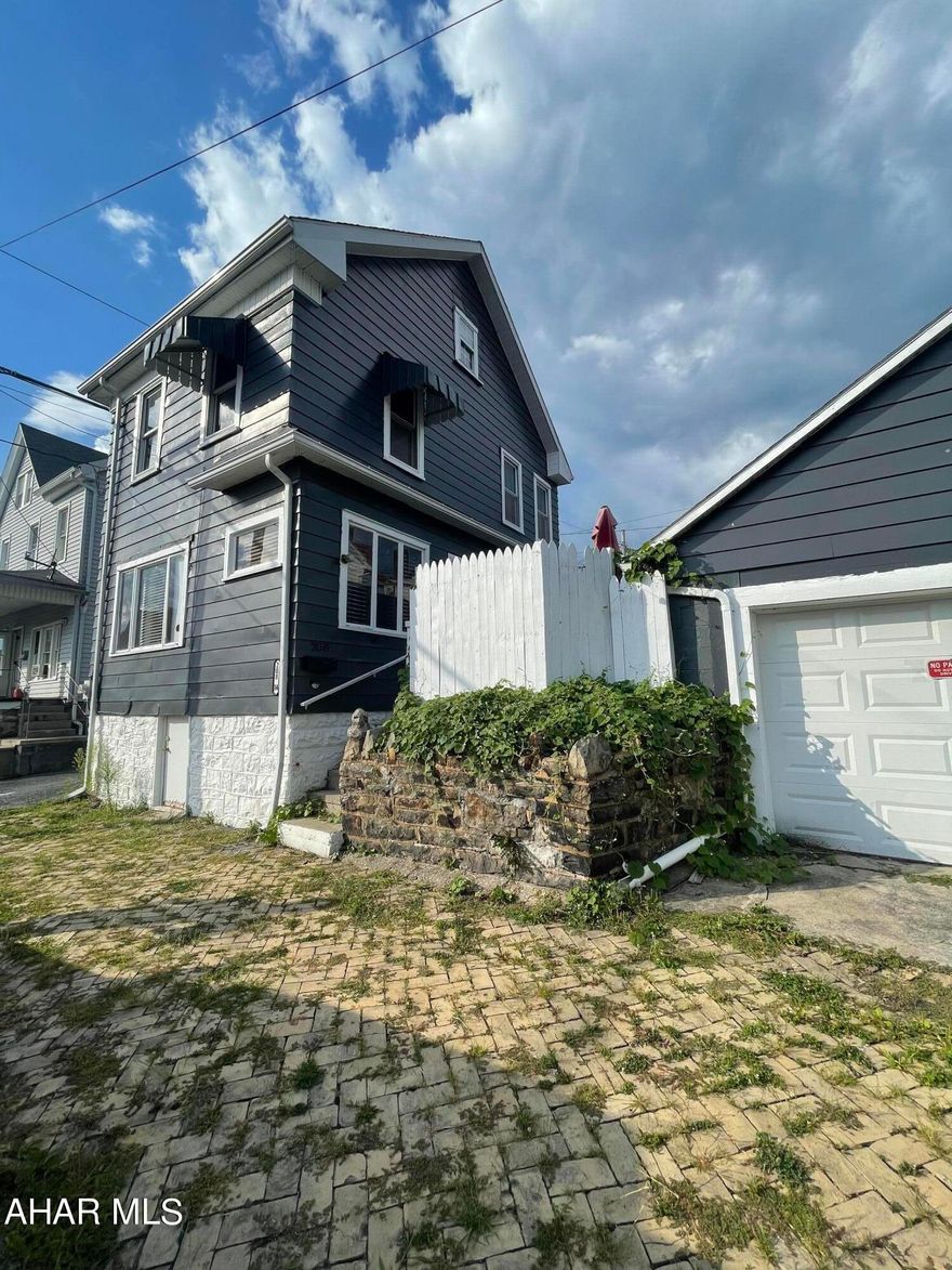 Well-maintained home close to the AAHS and Vo-Tech. It features an updated bathroom, 2014 hot water heater, and a 3 year old roof. This move-in ready home is being sold AS-IS with all furniture and appliances.  Attic is finished with a built-in bar. Outdoor area has a space for seating, next to the small garden! One-car garage for off-street parking- garage door openers and a keypad for entry/exit. Conventional or Cash buyer only. Must be pre-approved or have proof of funds. Motivated seller! Bring offers!