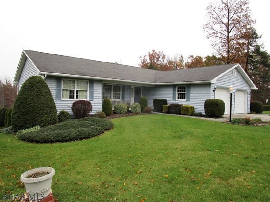 Very well maintained ranch home in Lakewood Manor with a double lot!! This home offers a living room, dining room, large kitchen, three bedrooms, two baths and a laundry room on the main level.  Full finished basement featuring a rec room with fireplace and half bathroom.  Basement is walk-out to ground level.  Natural gas forced air heat, central air, 200-amp electric and public water and sewer.  Attached two-car garage with pull down stairs for storage above and a large shed with pavilion.  This is a nicely built home with attention to detail and it has been very well cared for.