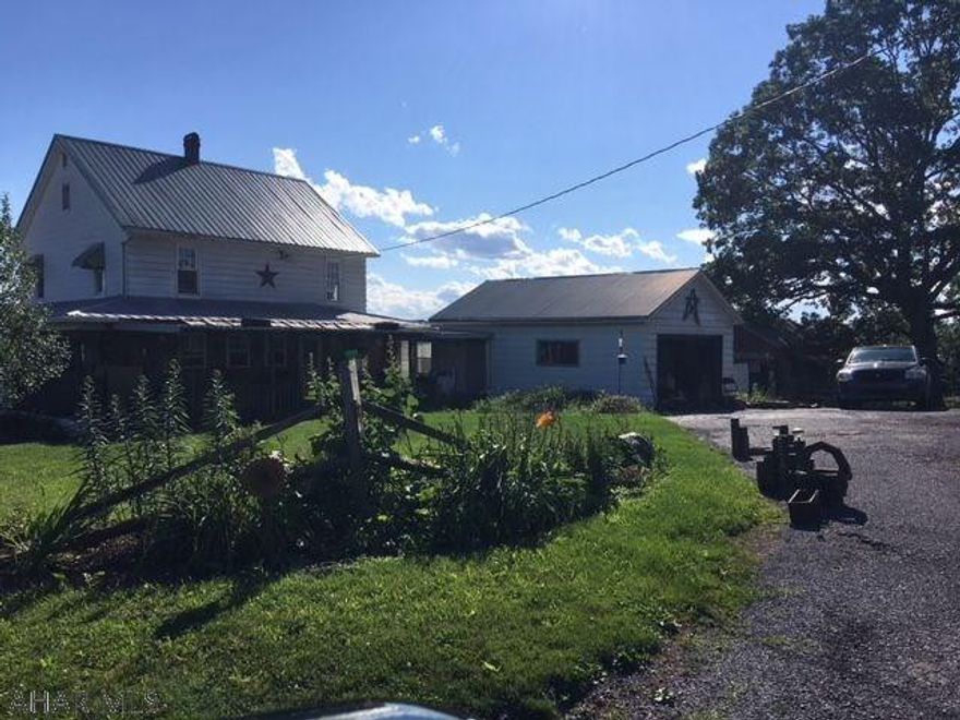 Country living on 3.494 acres. 3 bedroom home with outbuildings in a nice area. Needs TLC. Being sold AS-IS.