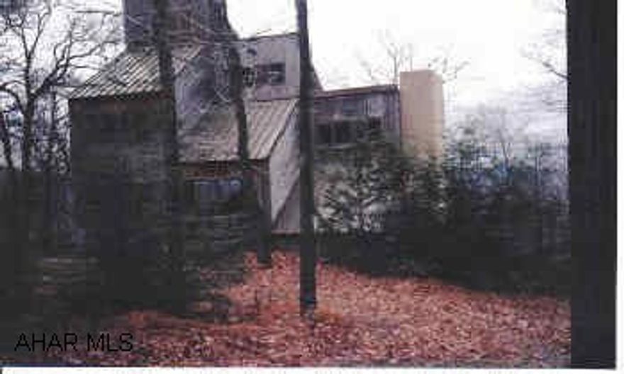 3 story contemporary home at Blue Knob Resort with hot tub and sauna.  Assoc Dues of $125/yr for trash, road maintenance and use of pools and tennis courts.