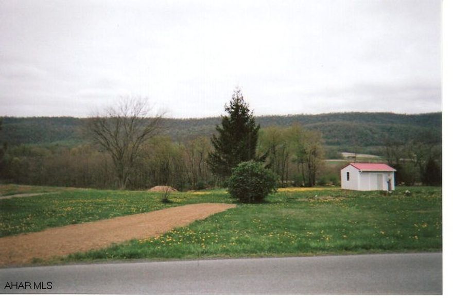 PRICE REDUCED....Looking at all offers. Spacious 1.45 acre, parcel is perk approved. Electric and phone on site. Great building site with country views.