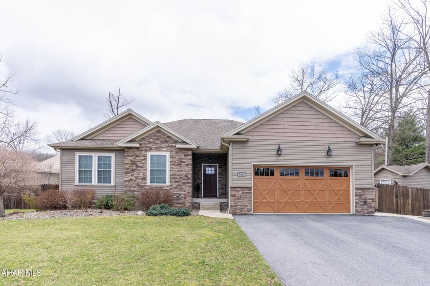 Step into this outstanding & magnificent home that is a symbol of luxury with it's beautiful engineered hardwood floors.  It exudes elegance from the moment you approach.  The main floor Master Suite has a walk in closet.  The perfect gourmet kitchen is a chef's delight! A striking feature is the spacious finished family room in the basement with a gas fireplace and also a Bonus Room.  Freshly painted , 2 car garage. Situated on a fenced in  .63  acre  lot that includes a firepit.  
Dream BIG!