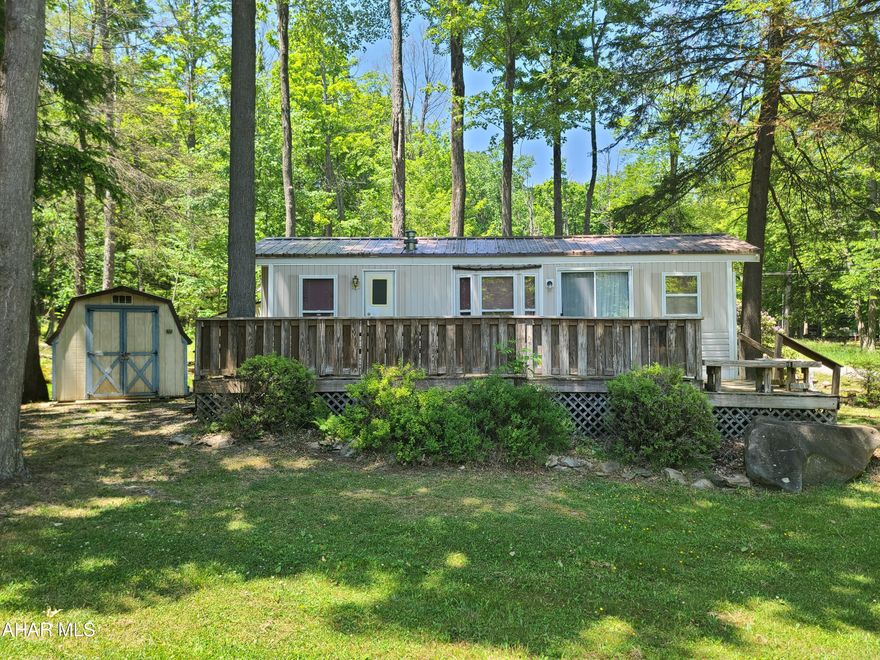 Park model camper located on 1 lot inside Glendale Yearound. 1 bed and 1 bath. Very roomy inside. Small deck on front of unit. This park model is on a corner lot which also includes a shed. Glendale Yearound is a gated community located minutes from Glendale Lake and Prince Gallitzin State Park.