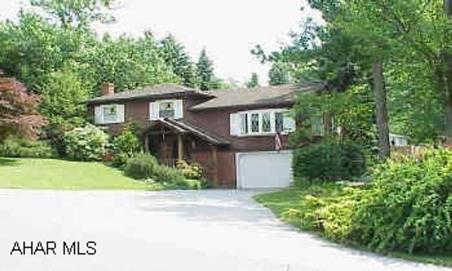 24 Hour Notice - Keys in Office. Lovely split level on a gorgeous lanscaped lot.  Inground heated pool with a large deck.  Enclosed and heated patio with new roof.  Whirlpool tub in the full bath and newer furnace.