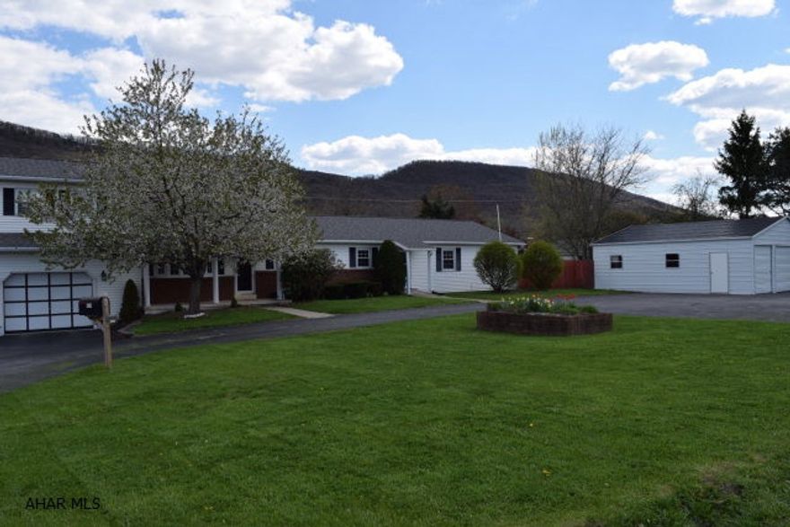 Oh, the possibilities with this House! Spacious 5 Bedroom, 2.5 bath home located in Bellwood-Antis School District. This updated home features a large breakfast bar with solid surface countertops throughout the kitchen, main floor family room, heated 21'X 12'5 sun room with ceramic tile floors that looks out over the inground heated 16X32 pool with Brand New Liner!  Large fenced in yard for privacy.  And let's not forget about the newly built 3 car garage that is in addition to the 1 car integral garage plus ample parking.  The extra space in the home could be used for Mother-in-law Suite, a home business, or for guests.  Easy access to I-99 and to Delgrosso Amusement  Park.