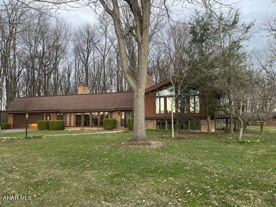 If you are looking for total privacy yet close to town this is the home for you!! 4 bedroom 4 bath multi level home on beautiful 10 acres with views from all sides of the home. Large windows from the living room and family room offer wonderful sunsets. Master bedroom suite with a private deck. Lower level offers 2 bedrooms with bath and second floor offers guest bedroom with additional bath. There is also a barn on the property with fenced in area for the animals. This home is a must see call today for a private showing