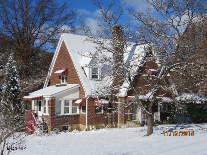 Nice 2 story brick home 3 bedrooms with 1.5 baths with hardwood floors.  Has 2 stone operational wood burning fireplaces.  New oil furnace in 2012, new roof, hot water heater was replaced in 2011.  All on 2.4 acres.  Possible fourth bedroom on main level or could be used as a den or office.