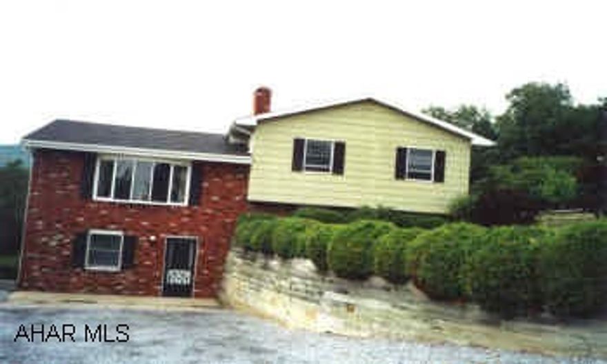 Special 4 bedroom Split Level on 1/2 Acre with Cathedral ceiling. A MUST SEE.