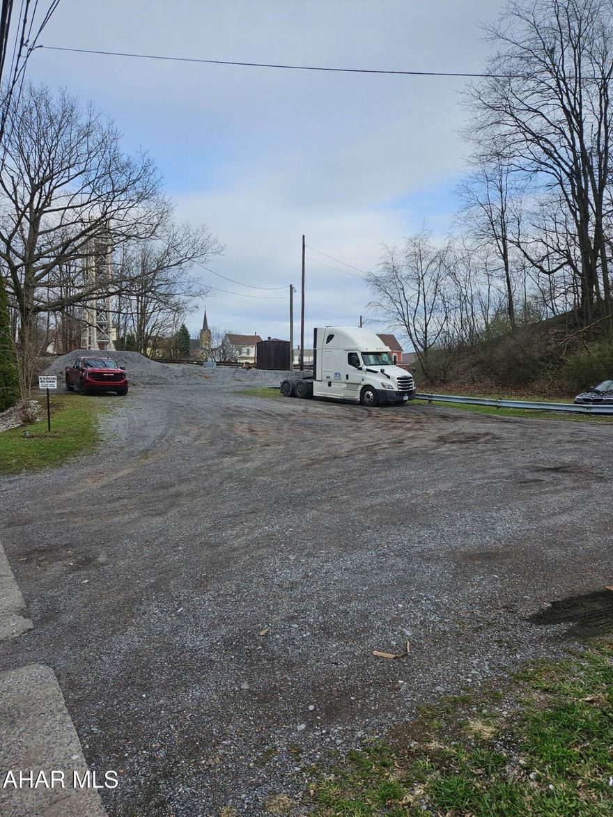 This nearly quarter-acre parcel offers a unique opportunity for train enthusiasts, located just steps away from the local rail line — an ideal spot to enjoy frequent views of passing trains. In addition to its prime location, the land provides flexible use options such as vehicle storage or other potential commercial or personal purposes. Whether you're looking for a practical space or a one-of-a-kind vantage point, this property is full of potential. Contact us today for more information!