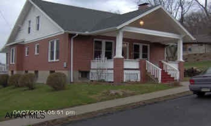 Stunning 3 bedroom, 2.5 bath brick home on quiet street.  Completely remodeled within last 3 years with all new windows and cherry woodwork throughout.  Kitchen and baths hav custom made cabinets and radiant heat tile flooring.  Cathedral wood-plank ceiling in living room.  Attached 2 car garage.