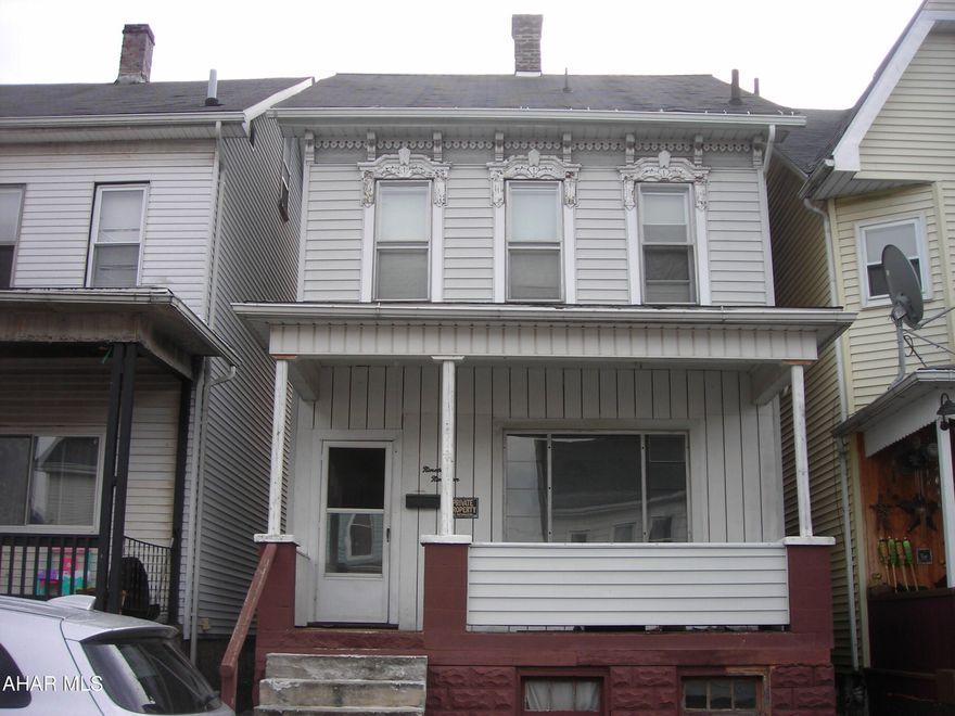 Good fixer upper or investment property. Rear off-street parking, fenced yard. Being sold as is/where is.