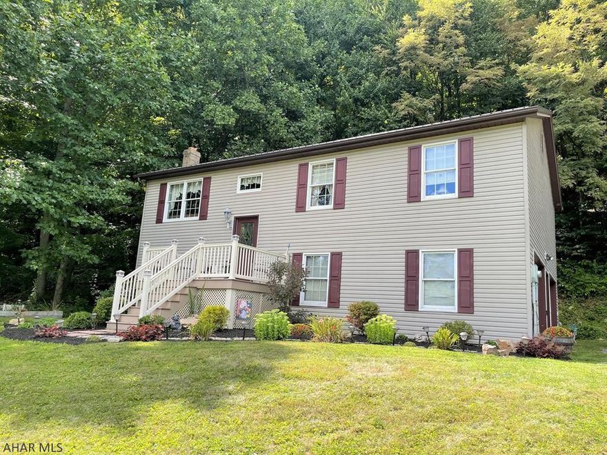 Well maintained and cared for split foyer home resting on .903 of an acre. Main level offers a living room, kitchen with dining area, three bedrooms and one and one half bathrooms. Lower lower is finished with a rec and family room, full bathroom and two-car integral garage. Electric baseboard heat, wood burning stove, 200-amp electric, private well, and private sand mound septic system. Metal roof, vinyl siding and double pane insulated windows. Maintenance free front porch to enjoy the mountain views or a private rear deck for relaxing. Very convenient location close to the Omni Bedford Springs Resort, downtown Bedford and major roads. Move-in ready!!