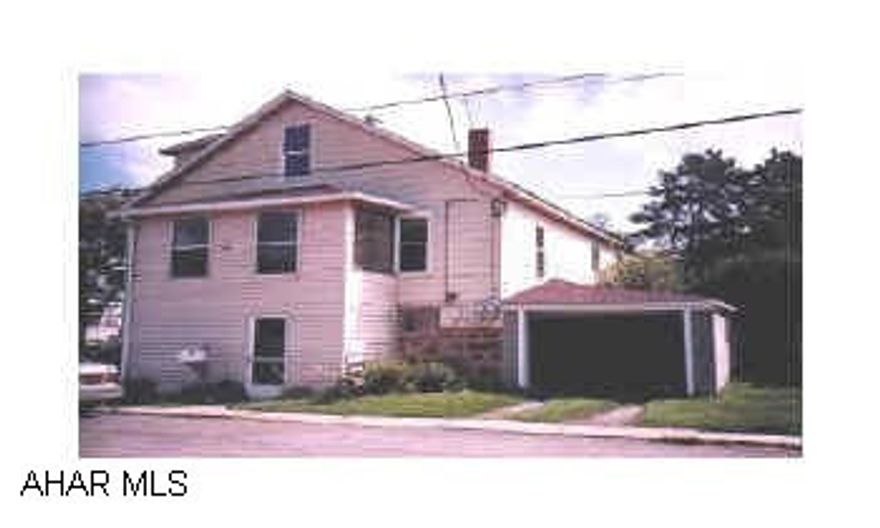 Nice large home, could be converted back to apartments. Hardwood floors, buyers taking some carpets. New replacement windows, yard fenced on one side, stone wall on the other. Nice large home, could be converted back to apartments. Hardwood floors, buyers taking some carpets. New replacement windows, yard fenced on one side, stone wall on the other.