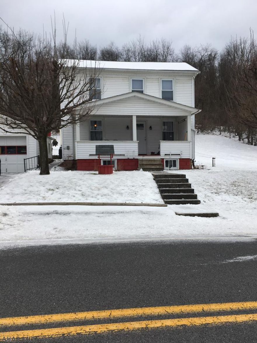 Do you want to own your own home at a affordable price? This home is priced to sell...move in condition...2 story vinyl sided home on 1st floor is laundry, 1/2 bath, eat in kitchen, dining room, living room...2nd floor has 3 bedroom and a full bath...more features 2 car garage, patio, yard, covered front porch. Listed for $98,900. Don't delay, call for a showing today!