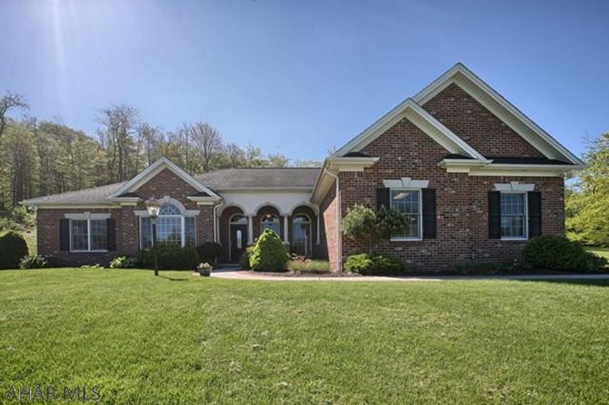 This stunning custom home features an all brick exterior and quality that has to be seen to be fully appreciated.  Hardwood and ceramic tile flooring, crown molding, tray and vaulted ceilings.  Radiant heat in floors makes for a comfortable Winter.  Absolutely beautiful master bedroom with fireplace and sitting room.   Newly finished lower level features large bedroom, full bath, and open concept living space for entertaining and family enjoyment.  All this on a 1.7 acre lot in one of Cresson's  loveliest neighborhoods.  MOTIVATED SELLER!