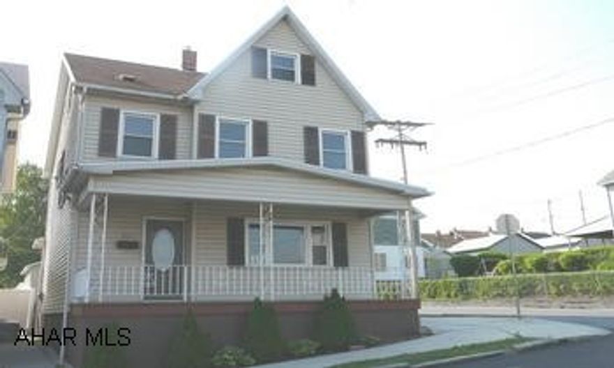 2-1/2 STORY WITH VINYL SIDING, 2 CAR GARAGE AND MANY UPGRADES WITHIN.  KITCHEN APPLIANCES INCLUDED. MOVE-IN CONDITION.  LARGE KITCHEN WITH NEW APPLIANCES.  HARDWOOD FLOORS IN DINING ROOM AND LIVING ROOM.   3 BEDROOMS, FULL BATH, NEW CARPETS, NEW FURNACE, LARGE 2 CAR GARAGE.