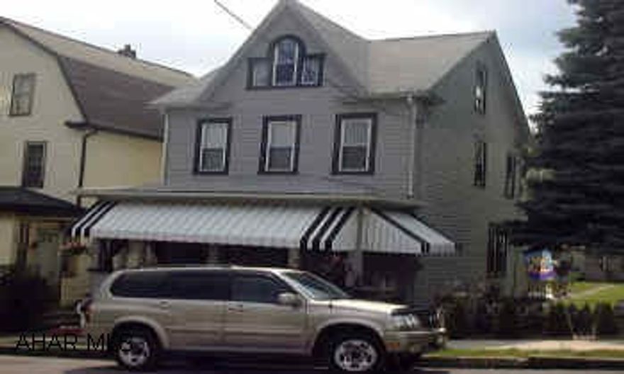 Immaculate 2.5 story with fenced double lot.Tastefully decorated with new oak kitchen,first floor bath,c/a,alarm system,finished third floor with heat/,c/a,garage with workshop,low taxes and utilities.Must be seen. Sellers to find suitable housing. Immaculate 2.5 story with fenced double lot.Tastefully decorated with new oak kitchen,first floor bath,c/a,alarm system,finished third floor with heat,c/a,garage with workshop,low taxes and utilities. Must be seen.Sellers may help with closing costs.