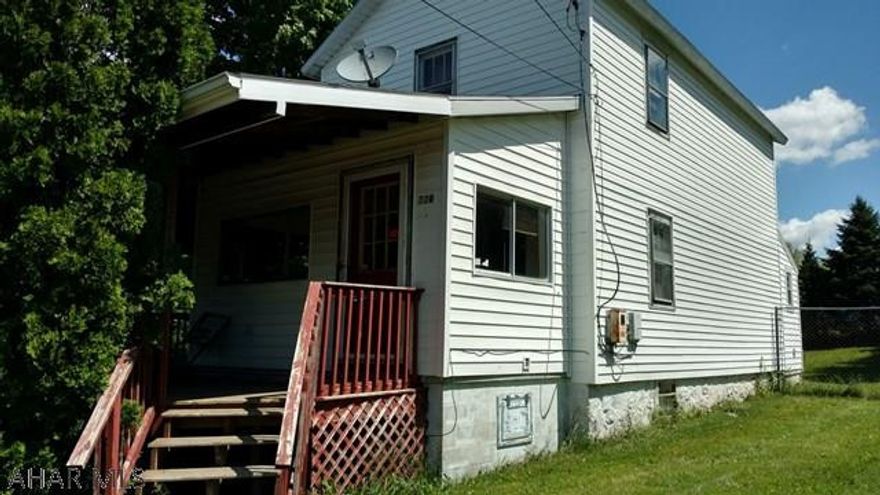 If you are looking for a fixer-upper that offers much potential here is one for you.Property offers fenced in yard on a corner lot,large wraparound front porch and natural gas hook up available at the curb.Open floor plan with first floor full bath.