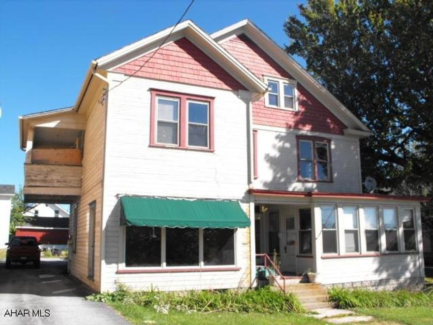 Lots of possibilities - needs extensive work.  as-is sale.  Probable freeze damage.  Unfinished remodeling.  Coal and gas furnace, unknown conditions.  Easily converted back to single family - original woodwork.  Large rooms.