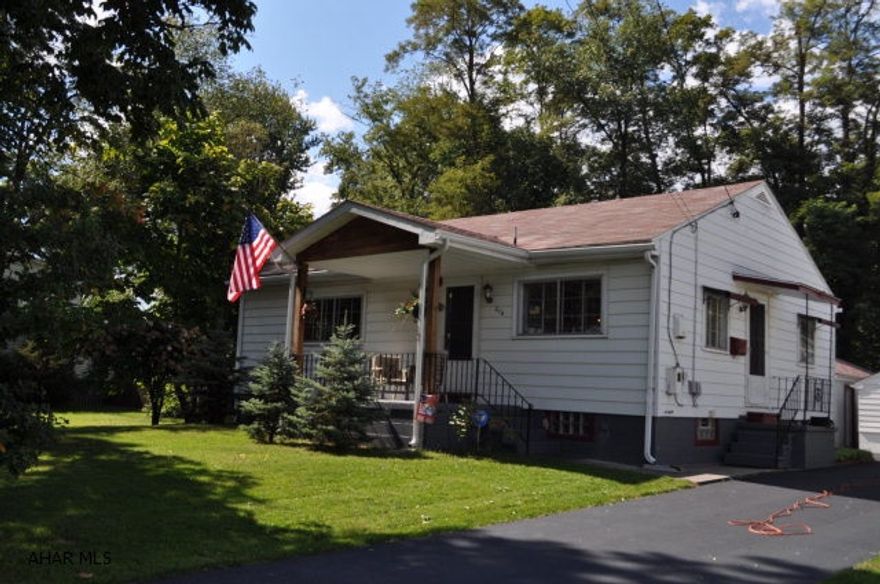 WELL BUILT ONE STORY FEATURES 2 BEDROOMS LARGE LIVING ROOM WITH HARDWOOD FLOORS, FULL BASEMENT HIGH CEILINGS,2 GARAGES WITH A PAVED DRIVEWAY,FENCED IN YARD THAT GIVE YOU A FEEL OF COUNTRY,CLOSE TO SHOPPING AND RESTAURANTS GREAT NEIGHBORHOOD