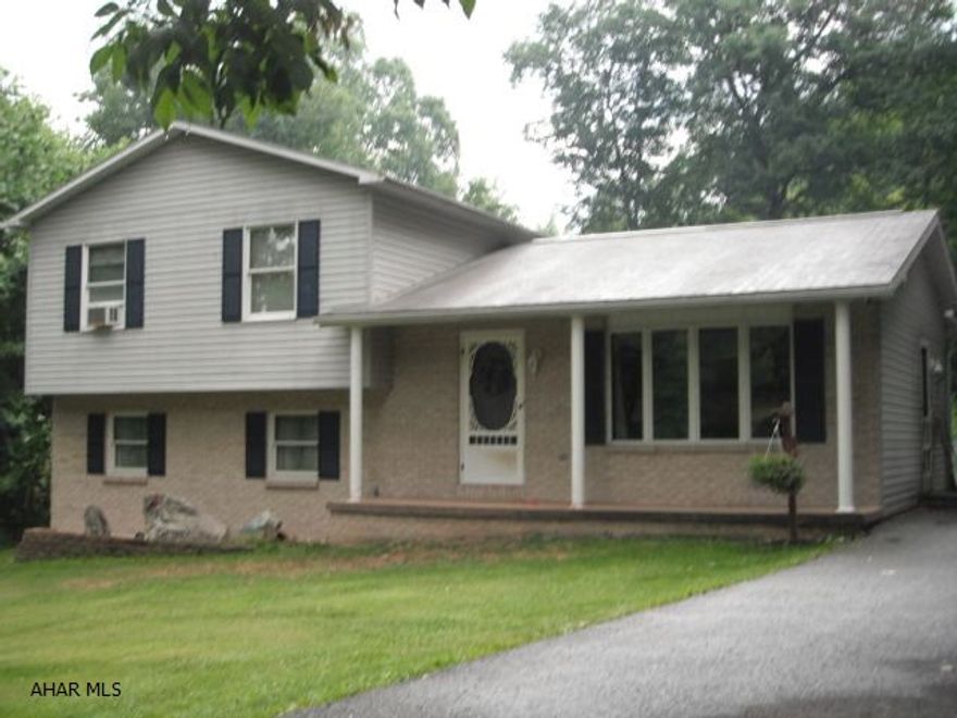 Good looking 3 Br. Split level in very nice condition!  Nestled on a 1/2 acre wooded lot, 18 X 36, in ground pool, spacious back yd. - this home is sure to please.  Being sold AS IS.