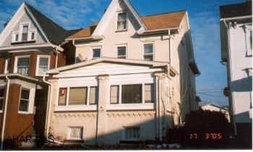 Large 2 Story Brick with 3 or 4 Bedrooms, Modern Eat-In-Kitchen, 2 Modern Baths, Formal Dining Room, Formal Living Room.   Property has 2 Stall Detached Garage, Roof and Furnace 5 years old; Finished Attic with Heat could be 4th Bedroom, Laundry Facilities in Basement.