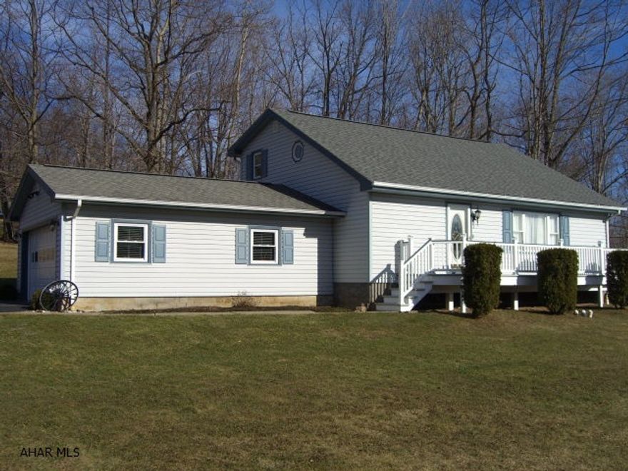 This is a meticulously maintained maintenance free 3 bedroom 2 bath home with one of the bedrooms located on the 1st floor. The home is situated on 1.4 acres with a private sun porch in the back and large maintenance free vinyl front deck for you to enjoy every part of the day. There is a pellet stove in the basement which can be finished and is plumbed for a third bath. There is a hook up for an emergency generator in case of a power outage . Don't wait and miss out on a move in ready home like this one in a very desirable location.