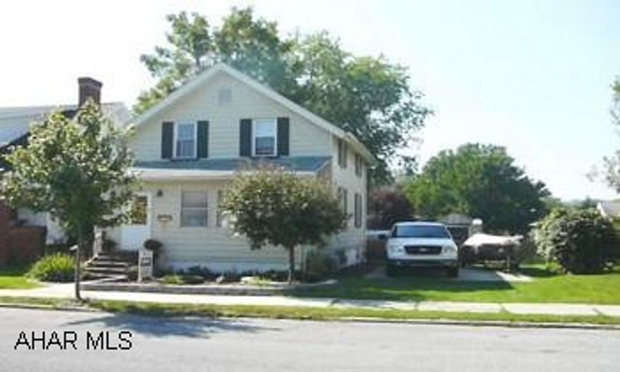 NEW HARDWOOD FLOORS IN LR AND DR, NEW CARPET ON 2ND FLR. MODERN KITCHEN.  ENCLOSED FRONT PORCH.  CEMENT PARKING PAD.  WOOD FENCED YARD.  LANDSCAPED.  NICE BACK YARD.  REAR ALLEY.