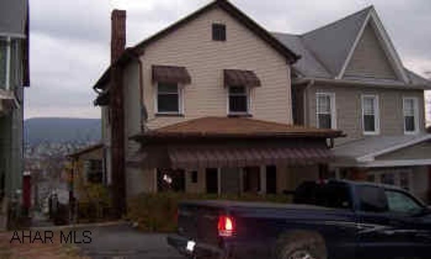 "sold as is" see listing agent for required addendum.  Buyer must pay both (2%) transfer taxes.  2 bedroom 2 story with 1 bedroom captive. Large garage. Great investment or starter home.