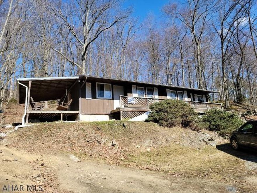 2 bedroom rancher on almost 1 acre. Modern kitchen and bathroom. Covered side deck. Priced to Sell. Oil tanks are not functional and need replaces. Call listing agent for details. Property being sold 'as is'.