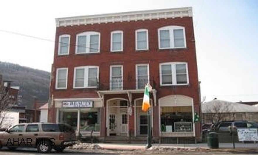 COMM./MULTI-UNIT IN THE HEART OF TYRONE WITH CONVENIENCE TO ALTOONA & STATE COLLEGE. THIS BUILDING HAS BEEN TOTALLY REHABBED BY CURRENT OWNER & INCLUDES 2 STOREFRONTS & 2 LUXURY APTS., FULLY OCCUPIED. CALL LORA 931-1018. COMM./MULTI-UNIT IN THE HEART OF TYRONE WITH CONVENIENCE TO ALTOONA & STATE COLLEGE. THIS BUILDING HAS BEEN TOTALLY REHABBED BY CURRENT OWNER & INCLUDES 2 STOREFRONTS & 2 LUXURY APTS. FULLY OCCUPIED. CALL LORA 931-1018.